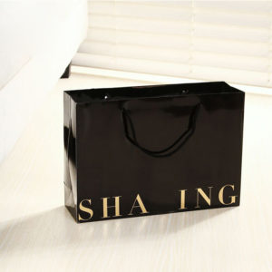 Boutique-luxury-embossed-hot-stamping-paper-perfume-bags-Shopping-Packaging-Paper-apparel-Bags-with-satin-handle-flat-rope