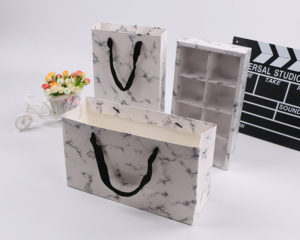 Premium-Custom-Paper-Gifts-Bags-handle-with-twist-rope-Euro-totes-paper-shopping--bags-packaging-Wholesale