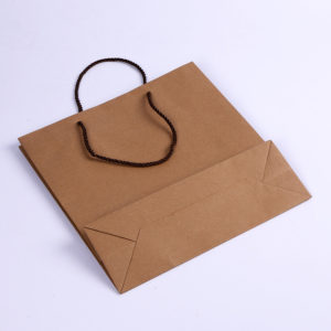 Premium-Custom-Paper-Gifts-Bags-handle-with-twist-rope -brown-kraft-merchandise-machine-made-paper-shopping--bags-packaging-Wholesale