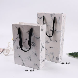Premium-Custom-Paper-Gifts-Bags-handle-with-twist-rope-white -merchandise-paper-shopping-bags-packaging-Wholesale
