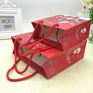 Wholesale-luxury-custom-Christmas-paper-shopping-bags-with-pp-rope-handles-wholesale-mfg