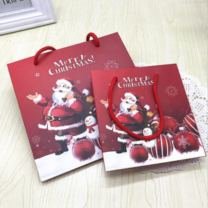 Wholesale-luxury-red-Christmas-paper-shopping-bags-uv-packaging-with-pp-rope --handles-wholesale-mfg